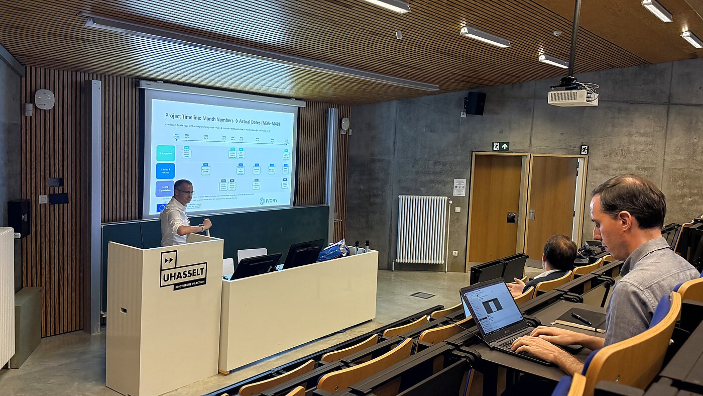 Doctoral candidate presenting the project timeline during the IVORY Hasselt meeting