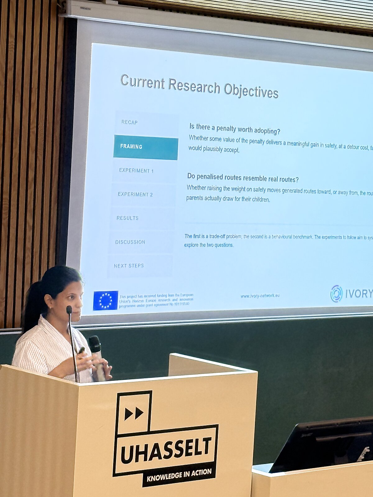 Doctoral candidate presenting current research objectives at Hasselt University
